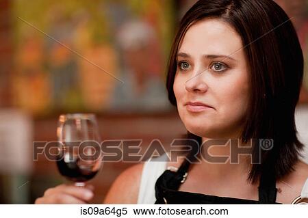 Server tasting wine in grocery store View Large Photo Image Stock Photography - Server tasting wine in grocery store. Fotosearch