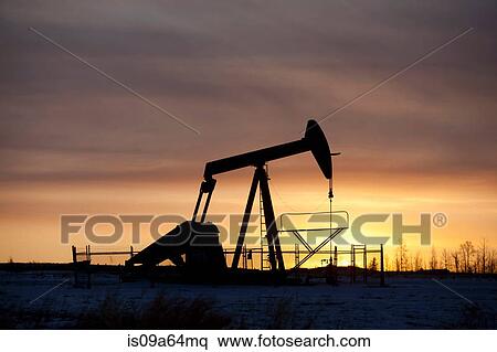 Silhouette of oil well at sunset View Large Photo Image Stock Photography - Silhouette of oil well at sunset. Fotosearch