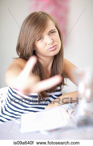 Teenage girl making peace sign View Large Photo Image Stock Image - Teenage girl making peace sign. Fotosearch