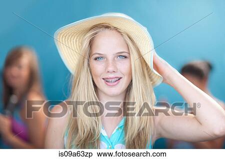 Teenage girl wearing floppy hat View Large Photo Image Stock Photography - Teenage girl wearing floppy hat. Fotosearch
