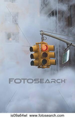 Traffic light on steamy city street View Large Photo Image Stock Image - Traffic light on steamy city street. Fotosearch