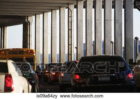 Traffic under urban overpass View Large Photo Image Stock Photo - Traffic under urban overpass. Fotosearch