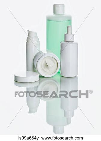 White bottles on counter View Large Photo Image Stock Photo - White bottles on counter. Fotosearch