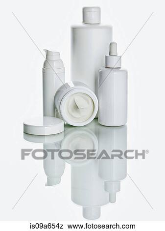 White bottles on counter View Large Photo Image Stock Photo - White bottles on counter. Fotosearch