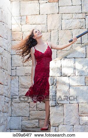 Woman climbing stone steps outdoors View Large Photo Image Stock Photo - Woman climbing stone steps outdoors. Fotosearch