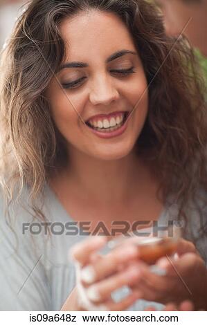 Woman holding cup of preserves View Large Photo Image Stock Photo - Woman holding cup of preserves. Fotosearch