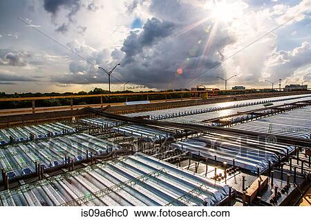 Stock Image - Aerial view of industrial containers. Fotosearch