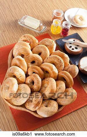 Bagels with butter and jam on table View Large Photo Image Stock Image - Bagels with butter and jam on table. Fotosearch