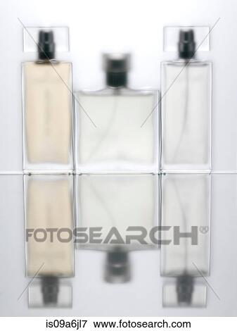 Blurred view of perfume bottles View Large Photo Image Stock Photo - Blurred view of perfume bottles. Fotosearch