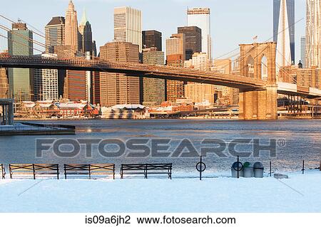 Stock Image - Brooklyn Bridge and city skyline. Fotosearch