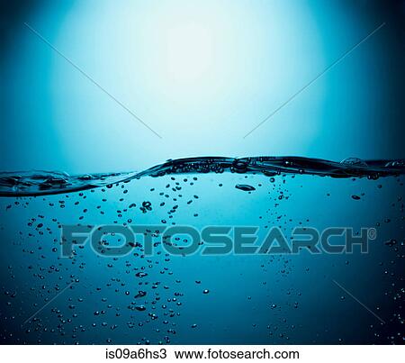 Stock Image - Bubbles floating in water. Fotosearch