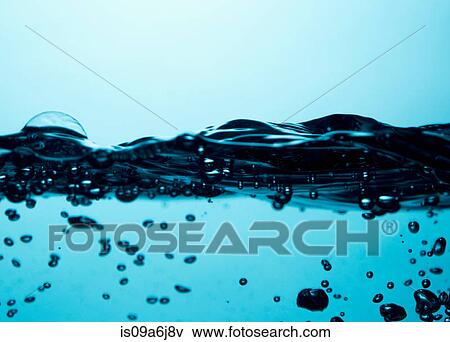Stock Photo - Bubbles floating in water. Fotosearch