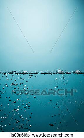 Bubbles floating in water View Large Photo Image Stock Photography - Bubbles floating in water. Fotosearch