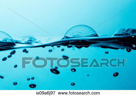 Stock Photo - Bubbles floating on water. Fotosearch