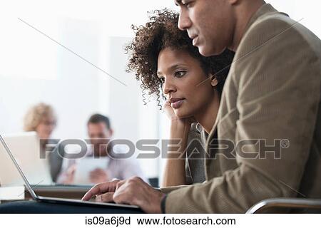 Business people working in office View Large Photo Image Stock Image - Business people working in office. Fotosearch