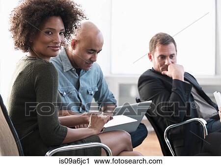Business people working in office View Large Photo Image Stock Image - Business people working in office. Fotosearch