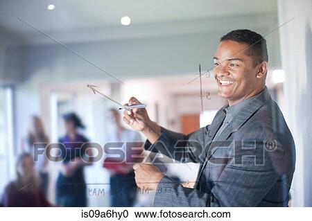 Businessman making graph on class View Large Photo Image Stock Image - Businessman making graph on class. Fotosearch