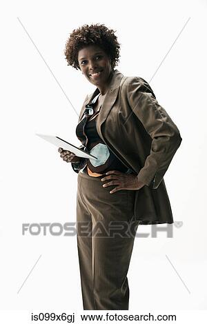 Businesswoman holding digital tablet View Large Photo Image Stock Image - Businesswoman holding digital tablet. Fotosearch
