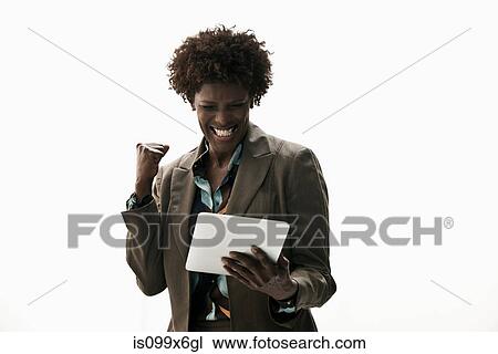 Businesswoman holding digital tablet View Large Photo Image Stock Image - Businesswoman holding digital tablet. Fotosearch