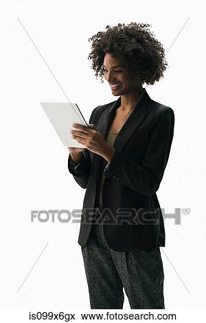 Businesswoman holding digital tablet View Large Photo Image Stock Photo - Businesswoman holding digital tablet. Fotosearch