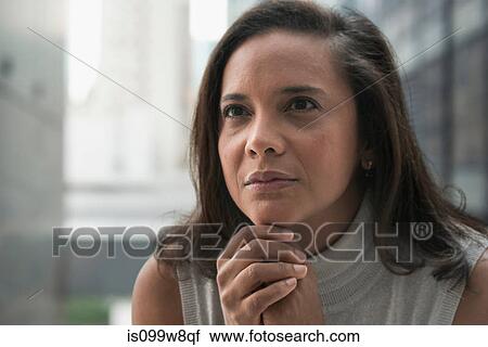 Businesswoman listening View Large Photo Image Stock Image - Businesswoman listening. Fotosearch