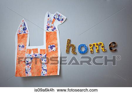 Stock Image - Child's artwork on refrigerator door. Fotosearch