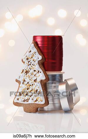 Stock Image - Christmas cookie and ribbons. Fotosearch