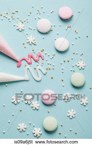 Stock Photograph - Christmas cookie decorations on table. Fotosearch