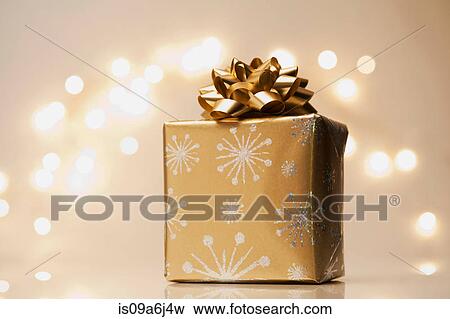 Stock Photo - Christmas gift on counter. Fotosearch
