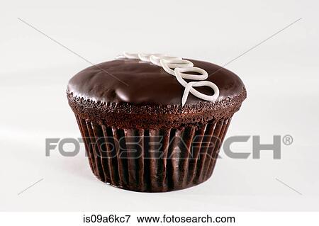 Stock Photo - Close up of chocolate cupcake. Fotosearch