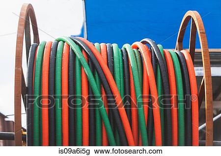 Stock Image - Close up of coiled hose. Fotosearch