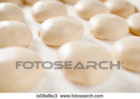 Close up of dough balls rising View Large Photo Image Stock Image - Close up of dough balls rising. Fotosearch