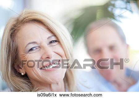 Stock Photo - Close up of older woman's smiling face. Fotosearch