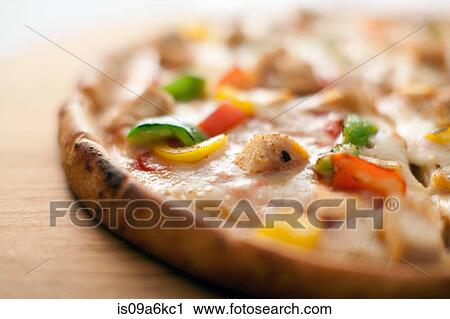 Stock Image - Close up of pizza crust. Fotosearch