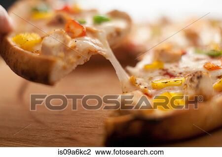 Close up of pizza crust View Large Photo Image Stock Image - Close up of pizza crust. Fotosearch