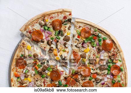 Stock Photo - Close up of pizza slice. Fotosearch