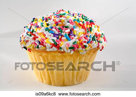 Close up of rainbow sprinkles cupcake View Large Photo Image Stock Photo - Close up of rainbow sprinkles cupcake. Fotosearch