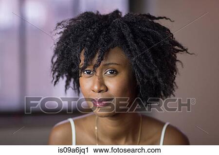 Stock Image - Close up of smiling woman's face. Fotosearch