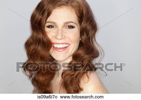 Picture - Close up of woman's smiling face. Fotosearch