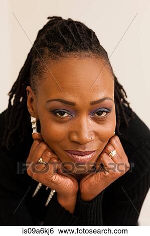 Stock Photograph - Close up of woman's smiling face. Fotosearch