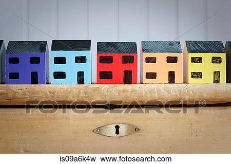Colorful model houses on dresser View Large Photo Image Stock Photo - Colorful model houses on dresser. Fotosearch