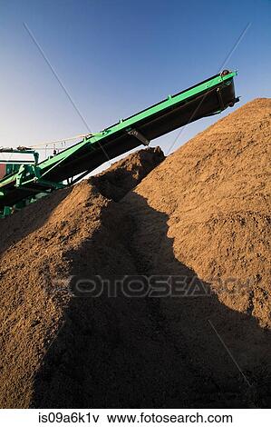 Stock Photo - Conveyor with topsoil in sandpit. Fotosearch