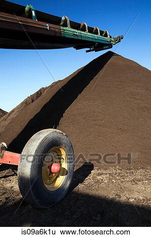 Conveyor with topsoil in sandpit View Large Photo Image Stock Photograph - Conveyor with topsoil in sandpit. Fotosearch