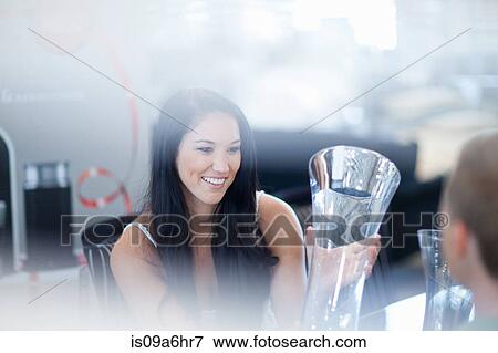 Stock Photo - Couple shopping for kitchenware in store. Fotosearch