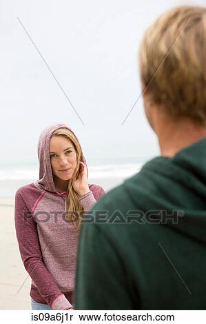 Stock Photography - Couple talking outdoors. Fotosearch