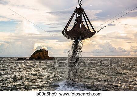 Stock Photo - Crane operating in water. Fotosearch