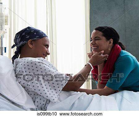 Daughter visiting mother in hospital View Large Photo Image Stock Image - Daughter visiting mother in hospital. Fotosearch