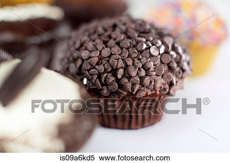 Stock Photography - Decorated cupcakes on counter. Fotosearch