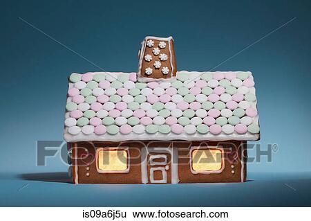 Stock Photograph - Decorated gingerbread house. Fotosearch