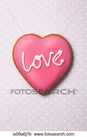 Stock Image - Decorated heart shaped cookie. Fotosearch